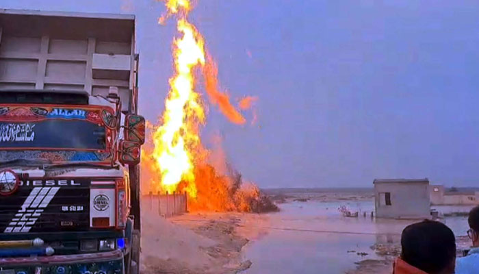 A raging fire near Korangi Crossing sends flames soaring into the sky, in Karachi on March 30, 2025. — PPI