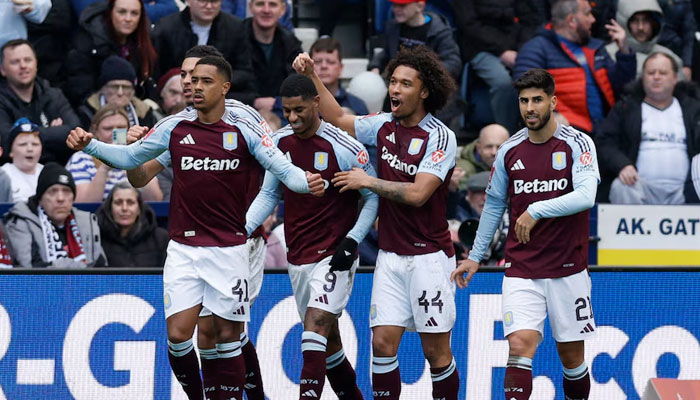 Aston Villas Marcus Rashford celebrates with teammates after scoring their first goal,March 30, 2025. —  Reuters