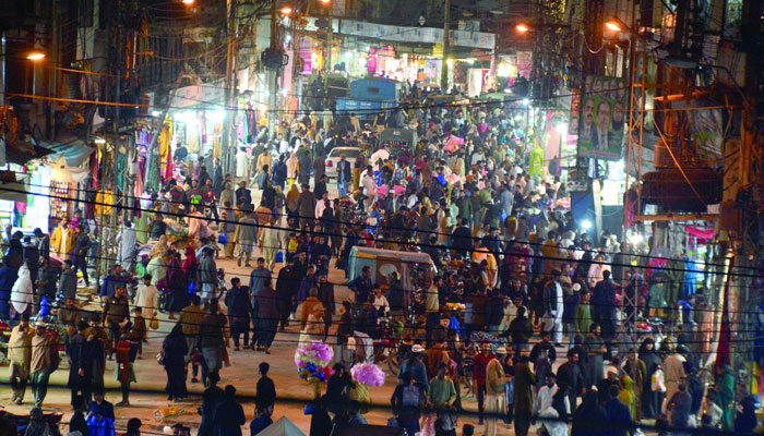 People busy in market for shopping. — APP/File