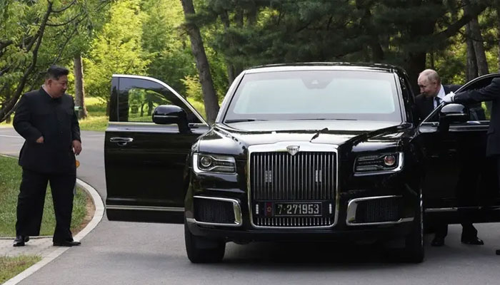 Russias President Vladimir Putin and North Koreas leader Kim Jong Un leave an Aurus car after a ride in Pyongyang, North Korea June 19, 2024. — Reuters