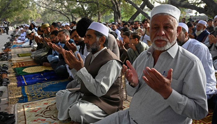 Muslims offer prayers during Eidul Fitr, that marks the end of the Islamic holy fasting month of Ramadan, in Peshawar on March 31, 2025. — AFP