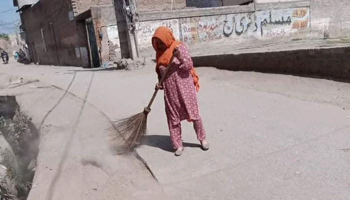 Water and Sanitation Services Peshawar worker cleaning the street in Peshawar on June 22, 2024. — Facebook@Commissioner Peshawar Division, Peshawar