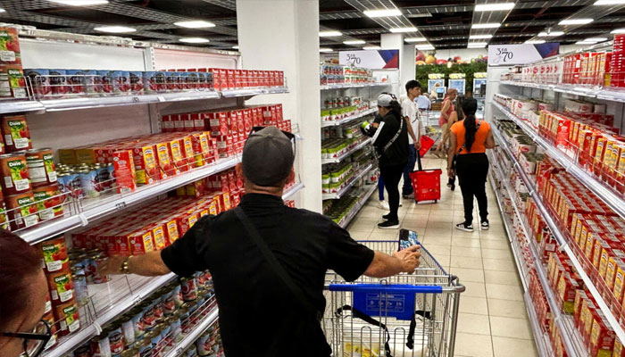 A person in a supermarket in cuba. —AFP/File