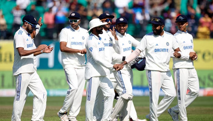 Indias Rohit Sharma and teammates celebrate after the match. —Reuters/File