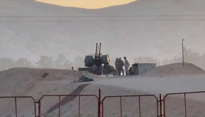 Military personnel stand guard at a nuclear facility in the Zardanjan area of Isfahan, Iran, April 19, 2024. —Reuters
