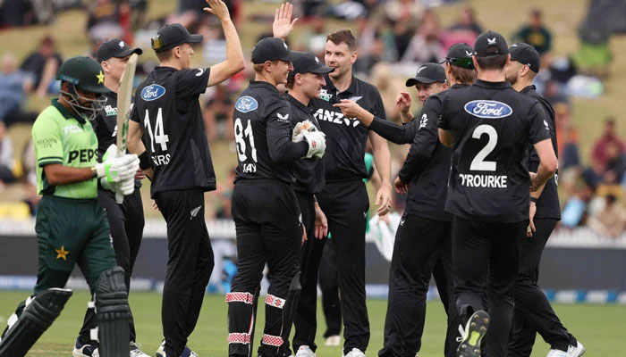 New Zealand´s Jacob Duffy celebrates the wicket of Pakistans Babar Azam during the 2nd ODI at Seddon Park in Hamilton on April 2, 2025. — AFP