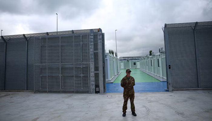 A member of Italian Army stands at a camp for illegal migrants in Gjader, Albania October 11, 2024.—Reuters