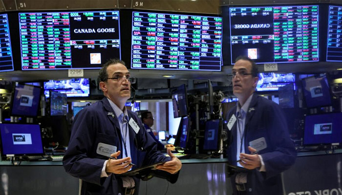 Traders work on the New York Stock Exchange (NYSE) floor in New York City, US on June 14, 2022. — Reuters
