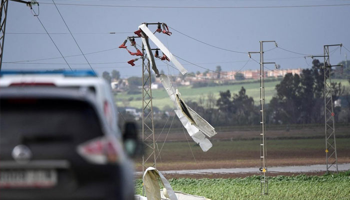 Debris at the site where an agricultural shed collapsed in Coria del Rio near Seville killing three persons during storm Nuria. — AFP/File