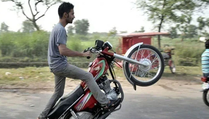 Representational image shows a young boy performing street stunts on a motorcycle this image released on May 27, 2019. — Facebook@alterbaikRiderRanipurking