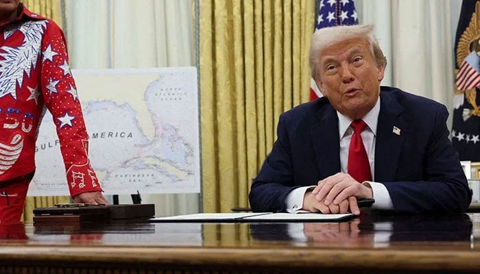 US President Donald Trump speaks next to Kid Rock on the day he signs an executive order related to the US live entertainment ticketing industry in the Oval Office at the White House in Washington, DC, March 31, 2025. — Reuters
