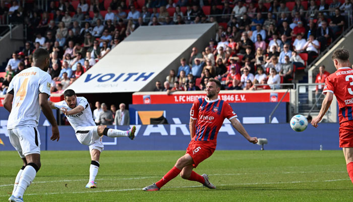 Emiliano Buendia (2nd left) while scoring 91st-minute winner for Bayer Leverkusen at Heidenheim. — AFP/File