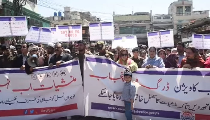 People participating in an awareness walk. — Facebook@Rawalpindicpoofficeoffical/File