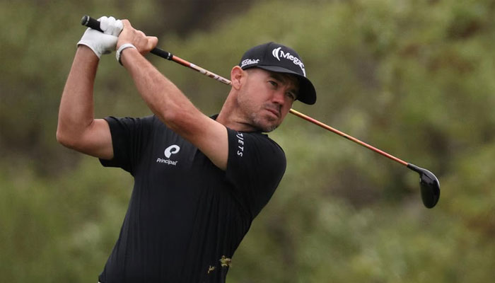 Leader Brian Harman of the United States playing his shot from the 18th tee during the third round of the Valero Texas Open 2025 at TPC San Antonio on April 5, 2025 in San Antonio, Texas. —AFP