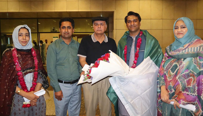 Schoolteachers pose for a photo in this image on April 6, 2025. — Facebook@RanaSikandarHayat.Official