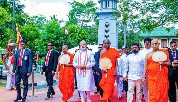 Sri Lankan President Anura Kumara Dissanayake (4th right) and Indias Prime Minister Narendra Modi (4th left) visited the Sri Maha Bodhi temple in Anuradhapura, April 6, 2025. —AFP