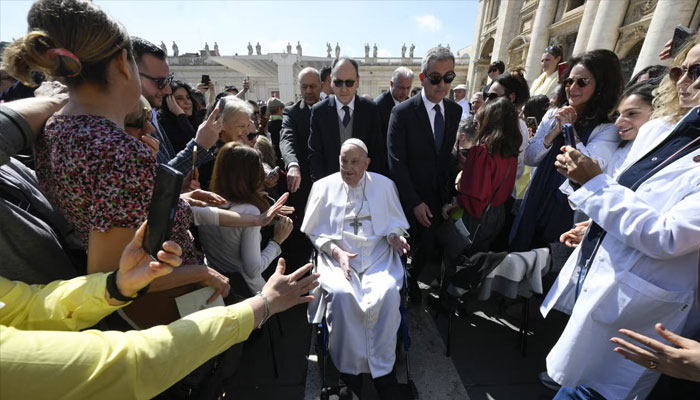 This photo taken and handout on April 4, 2025 by The Vatican Media shows Pope Francis during a surprise appearance at the end of a mass for the sick and healthcare workers as part of the Jubilee Year in The Vatican. —AFP