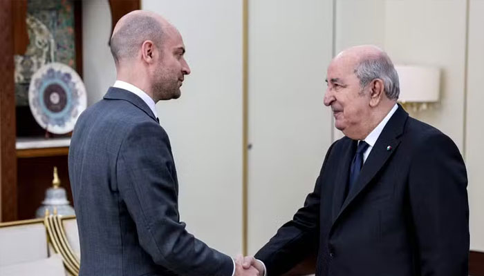 This handout photograph released by the French Ministry for Europe and Foreign Affairs (MEAE) shows Frances Foreign Minister Jean-Noel Barrot (left) being received by Algerias President Abdelmajid Tebboune in Algiers on April 6, 2025. —AFP