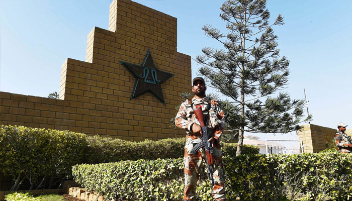 Rangers stand guard outside the National Cricket Stadium for the forthcoming PSL final match. —AFP