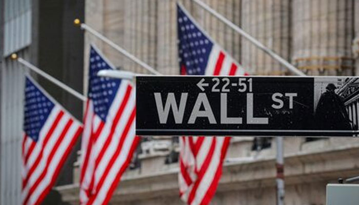 The Wall Street sign is seen outside The New York Stock Exchange (NYSE) in New York. — Reuters/File