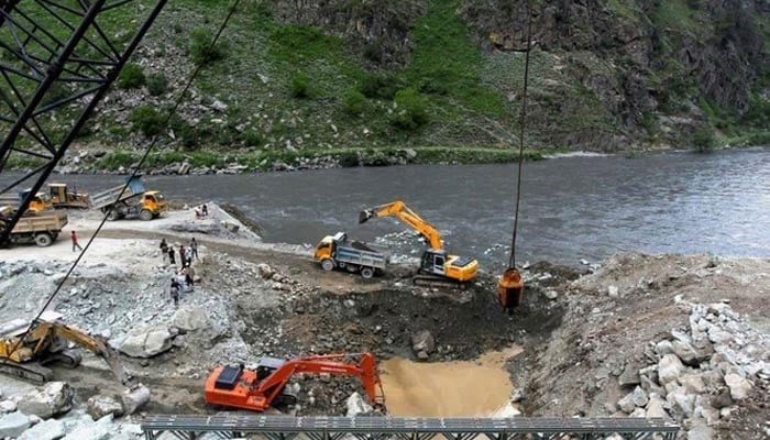 A representational image showing excavators being used at the dam site of Kishanganga power project in Gurez, Srinagar in IIOJ&K on June 21, 2012. — Reuters