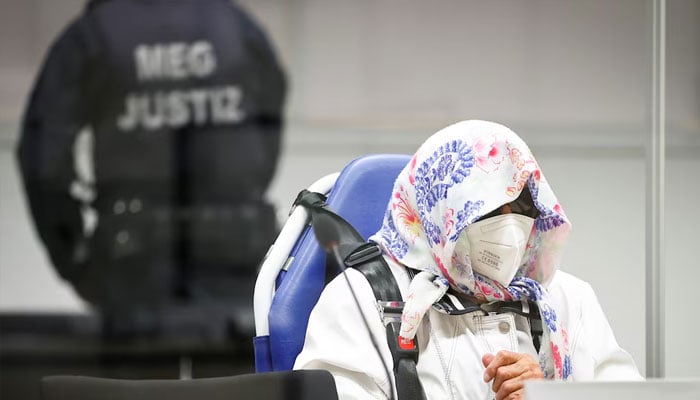 Irmgard Furchner, a 96-year-old former secretary to the SS commander of the Stutthof concentration camp, is pictured at the beginning of her trial in a courtroom, in Itzehoe, Germany, October 19, 2021.—Reuters