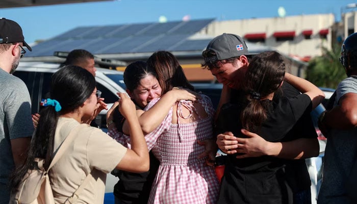 People react at the site where the roof of the Jet Set nightclub collapsed, in Santo Domingo, Dominican Republic, April 8, 2025. —Reuters