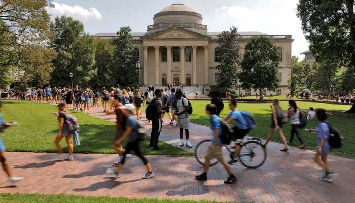 Students walk past Wilson Library on the campus of the University of North Carolina at Chapel Hill, North Carolina, US, September 20, 2018. — Reuters