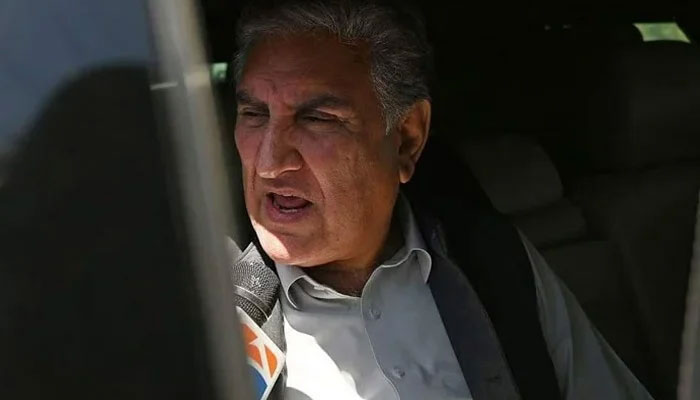PTI leader Shah Mahmood Qureshi speaks with the media in Islamabad. — AFP/File