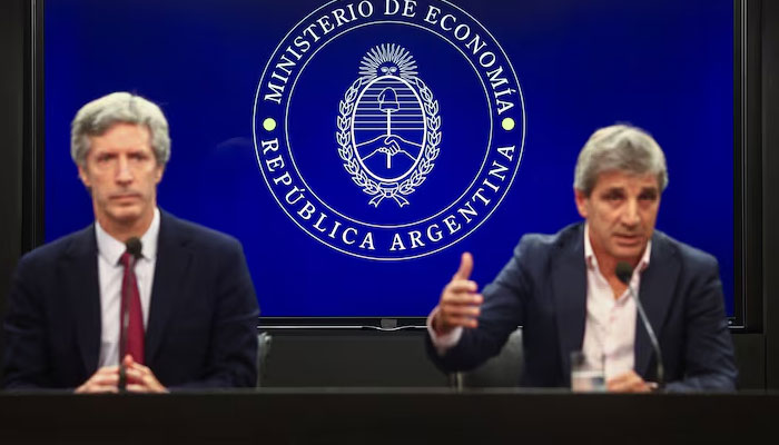 Argentinas Economy Minister Luis Caputo and Central Banks President Santiago Bausili attend a press conference following a staff-level agreement with the International Monetary Fund (IMF) on the latest review of the countrys $44 billion debt program, at the Economy Ministry building in Buenos Aires, Argentina, January 10, 2024. — Reuters