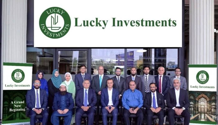 Lucky Investment officials posing for photo after inauguration of their new office at the Finance and Trade Centre, March 4, 2025. —APP