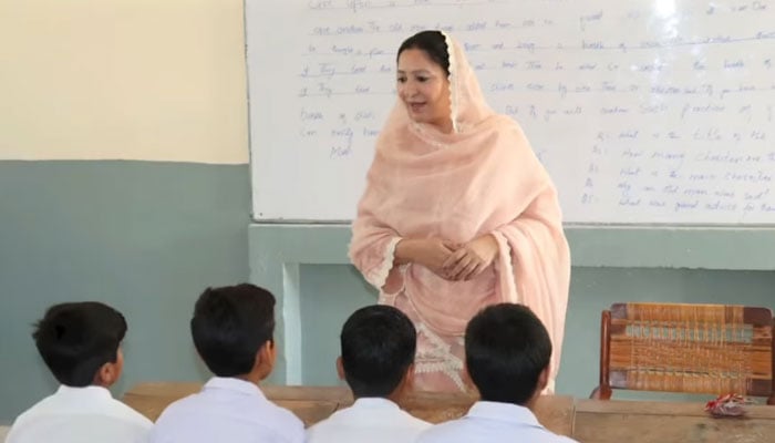 State Minister for Education Wajeeha Qamar interacts with students during her visit to public school in Shah Allah Ditta area on the outskirts of Islamabad on April 8, 2025. — Screengrab via Facebook@mofept
