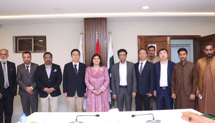 A high-level delegation from CIIC in a group photo with Federal Minister for Education and Professional Training, Khalid Maqbool Siddiqui (centre right) during visit to the NAVTTC headquarters in Islamabad on April 9, 2025. — Facebook@NAVTTCOfficial
