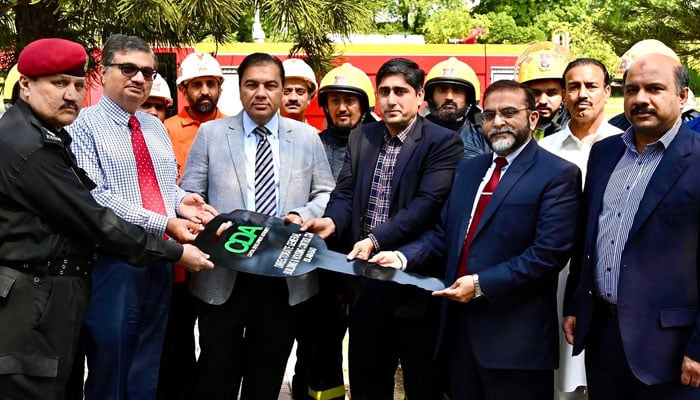 Chairman CDA and Chief Commissioner Islamabad Muhammad Ali Randhawa giving key of latest Fire Tender Vehicle to Fire Services Department offices on April 9, 2025. — INP