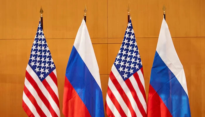 Russian and US flags are pictured before talks between Russian Deputy Foreign Minister Sergei Ryabkov and US Deputy Secretary of State Wendy Sherman at the United States Mission in Geneva, Switzerland, January 10, 2022. — Reuters
