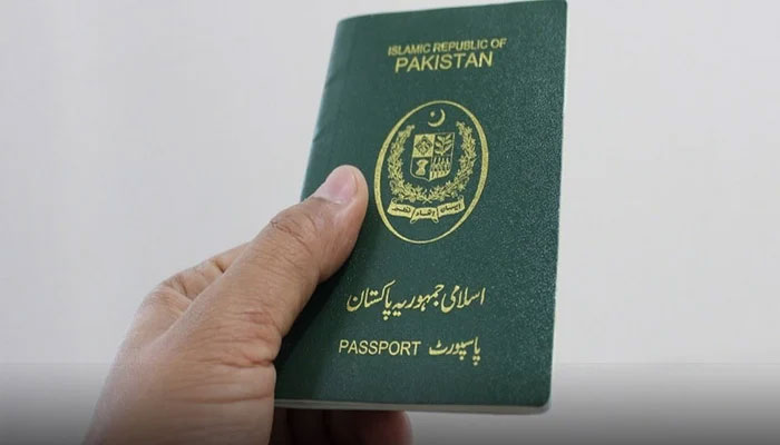This photograph shows a book of Pakistani passport. — Radio Pakistan/File
