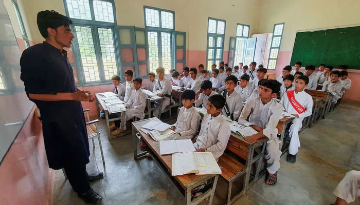 Students attend a class at a school in Battagram, Khyber Pakhtunkhwa. — Reuters/File