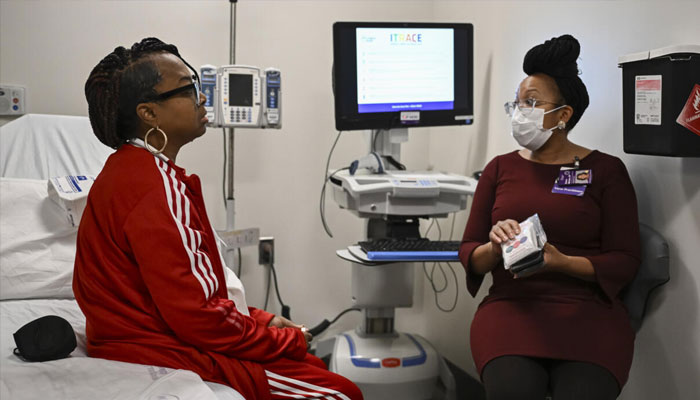 Towana Looney (left) is seen in NYU Langone Hospital in New York on December 11, 2024, just weeks after receiving a transplanted pig kidney. — AFP/File