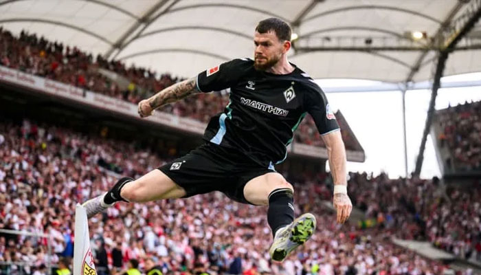 Bremens Oliver Burke celebrates scoring his sides second goal during the German Bundesliga soccer match between VfB Stuttgart vs Werder Bremen AT MHPArena. —AFP/File