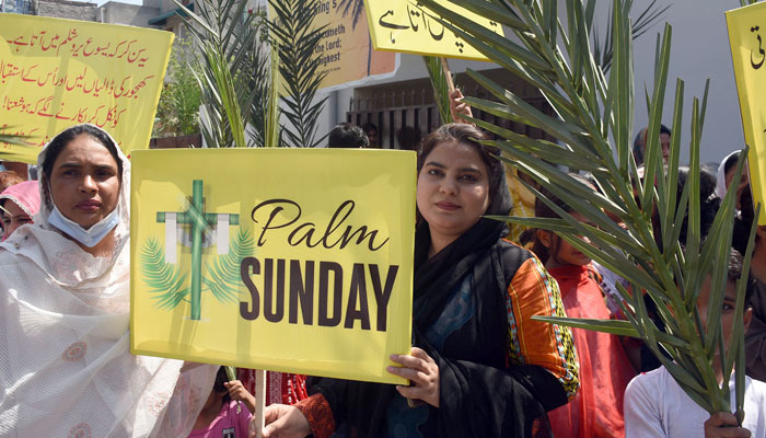 Christian devotees holding palm leaves attend a service to mark Palm Sunday as part of the traditional Lenten devotion at a Church in Punjab on April 13, 2025. — Online