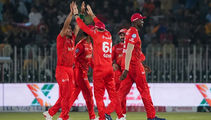 Islamabad United players celebrate a wicket during PSL 10 match against Peshawar Zalmi at the Rawalpindi Cricket Stadium on April 14, 2025. — PCB