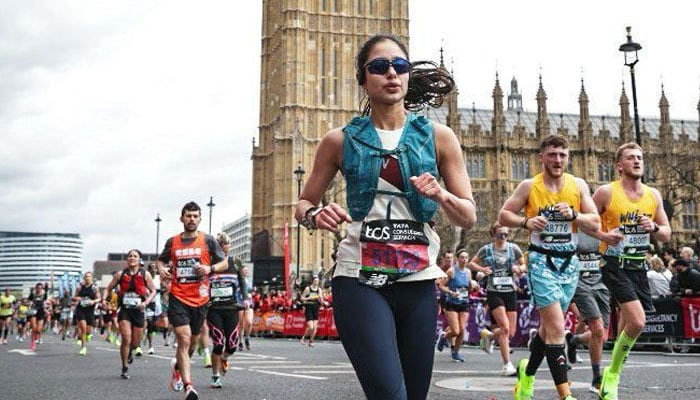 This undated photo shows runners participate in marathon race. — Athletes/File
