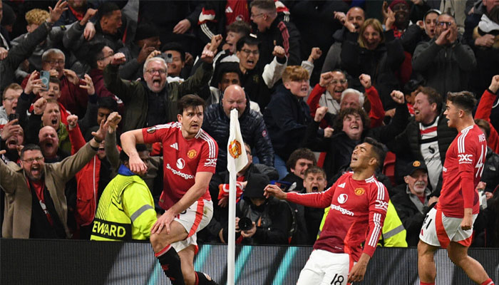 Man Utd players seen celebrating in this image.— AFP/File