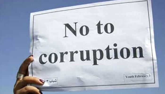 This representational image shows No to corruption on a placard. — Reuters/File