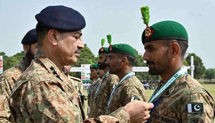 Chief of Army Staff (COAS) Gen Syed Asim Munir distributing medals to the soldiers, April 19, 2025. —Facebook@ISPROfficial1