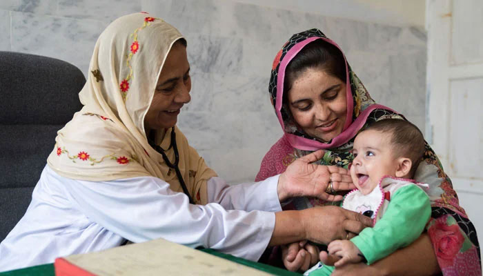 A representative image showing a doctor inspecting a child. — AKF website/File