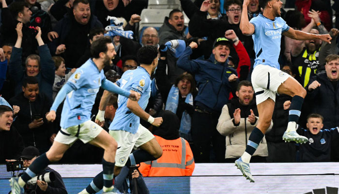 Manchester Citys Matheus Nunes (right) celebrates after scoring against Aston Villa. —AFP/File