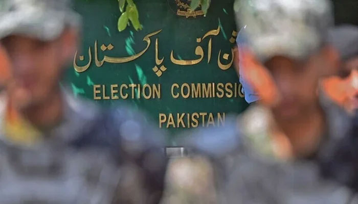 Paramilitary soldiers stand guard outside Pakistan’s election commission building in Islamabad. — AFP/File