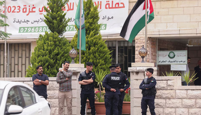 Jordanian police stand outside the Islamic Action Front office in Amman, Jordan April 23, 2025. —Reuters