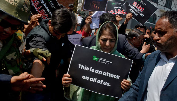 Mehbooba Mufti, former chief minister of Jammu and Kashmir and leader of Peoples Democratic Party (PDP), holds a placard during a protest against the attack on tourists, following a suspected militant attack near south Kashmirs scenic Pahalgam, in Srinagar(IIOJK), April 23, 2025.—Reuters
